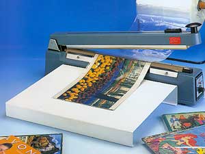 瞬熱式手壓帶刀封口機