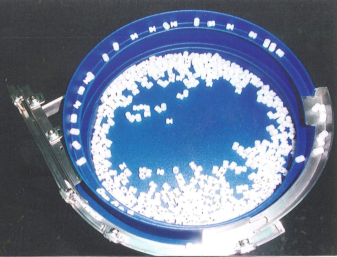 塑膠材-震動整列送料機設計製造