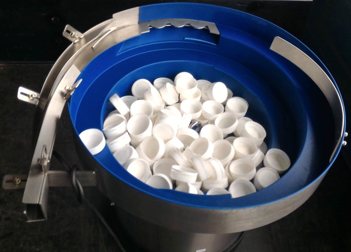 塑膠瓶蓋-震動整列送料機設計製造