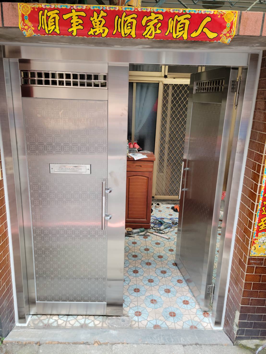 1樓對開玄關門更換2.施工後